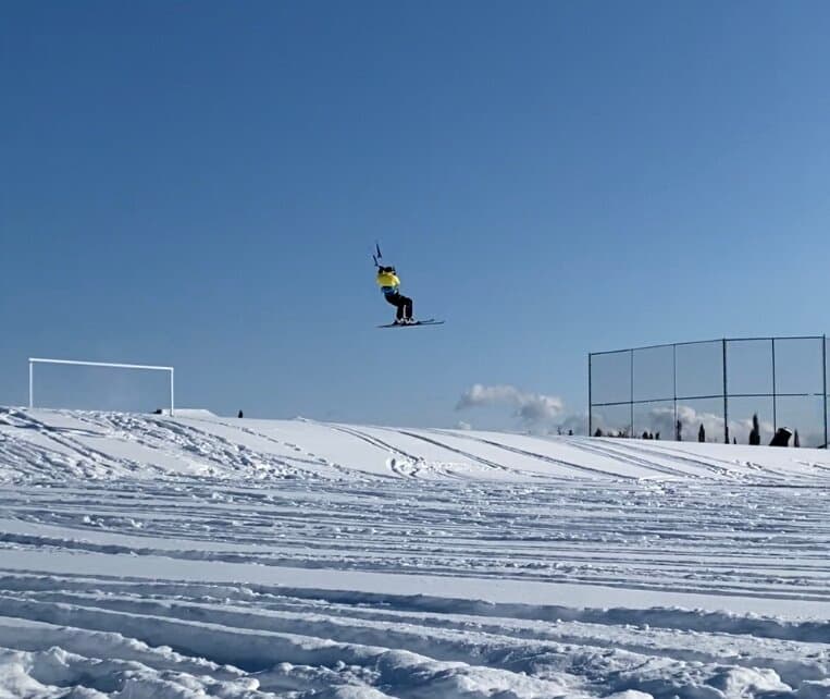 Snow kiter in air in snowy Canmore