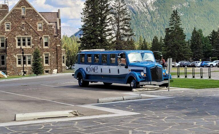 1930s vintage style open top tour bus in Banff