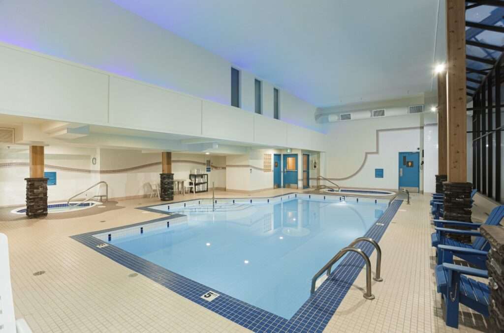 Indoor heated swimming pool from the farside at the High Country Inn, Banff