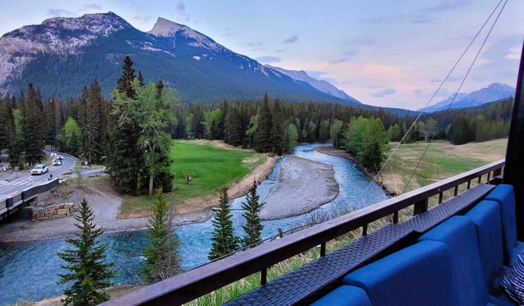 View of mountains, river and part of the golf course from Fairmont Banff Springs Hotel