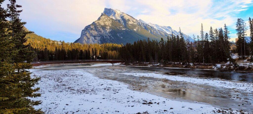 November in Banff along the river sprinkled with snow